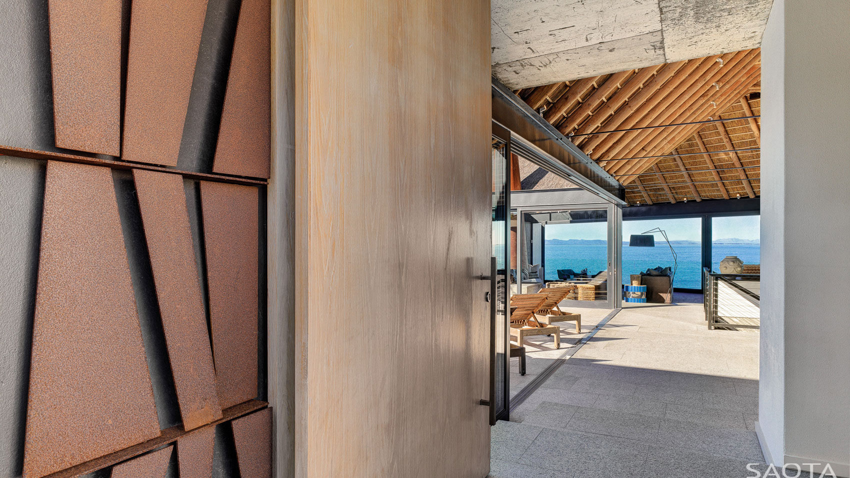 A Playful and L-Shaped Contemporary House with Spectacular Ocean Views in Shelley Point by SAOTA (4)