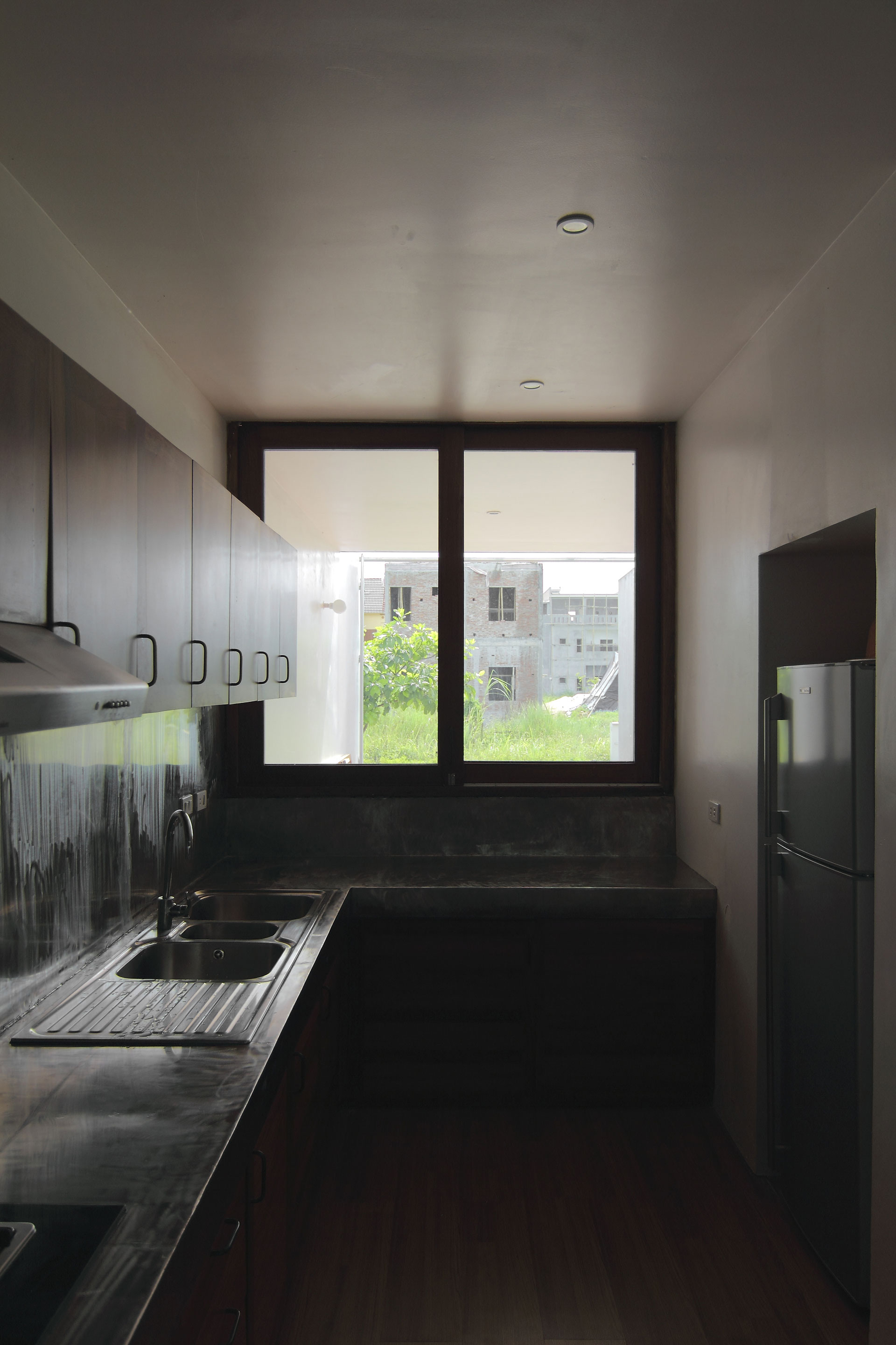 A Simple Country House with Natural Light and Wooden Furniture in Nghe An by Wangstudio (14)