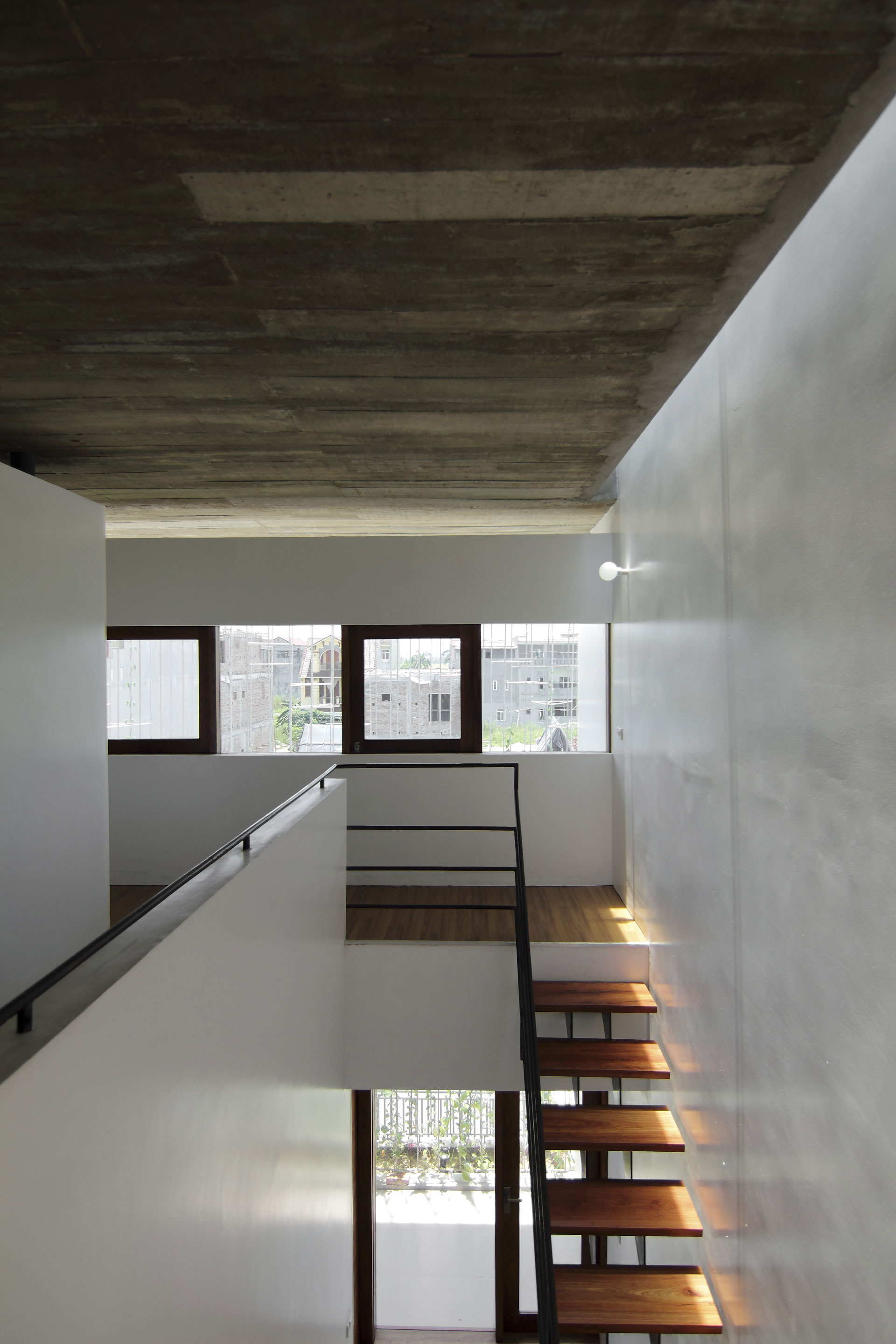 A Simple Country House with Natural Light and Wooden Furniture in Nghe An by Wangstudio (25)