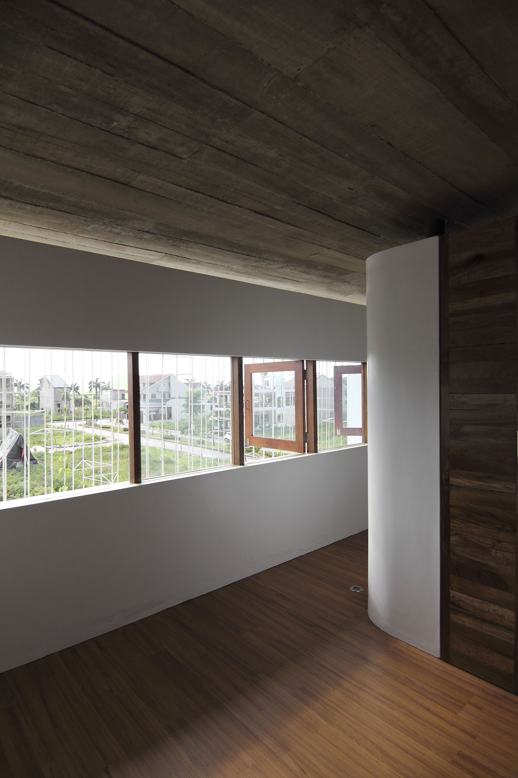A Simple Country House with Natural Light and Wooden Furniture in Nghe An by Wangstudio (32)