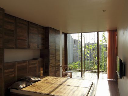 A Simple Country House with Natural Light and Wooden Furniture in Nghe An by Wangstudio (33)