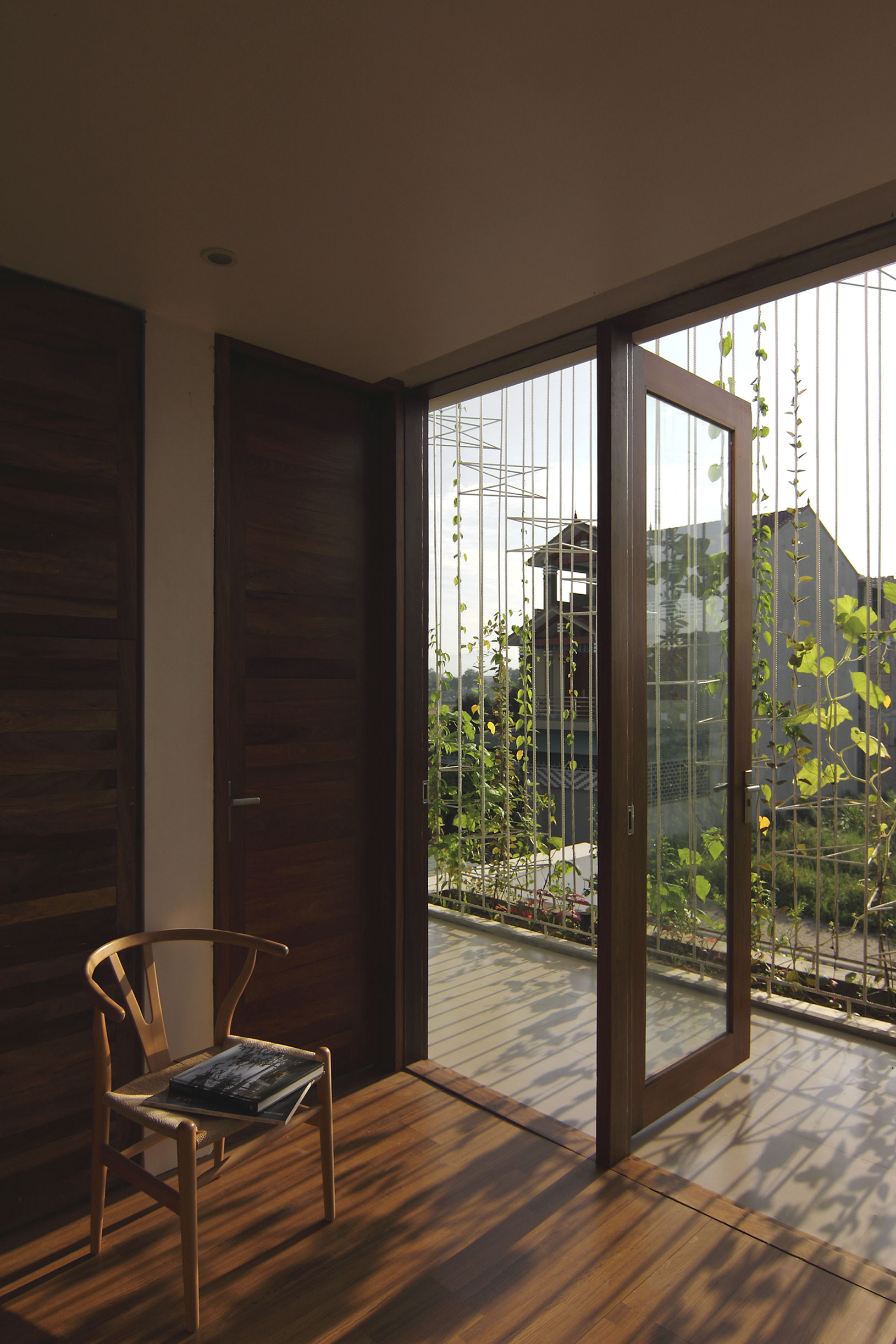 A Simple Country House with Natural Light and Wooden Furniture in Nghe An by Wangstudio (35)