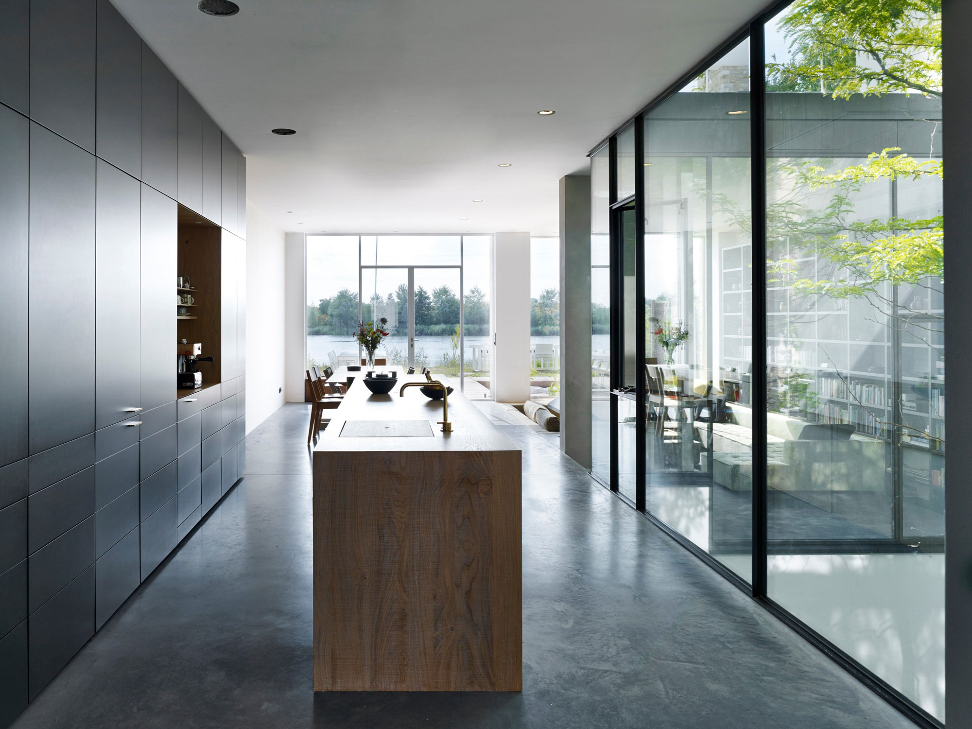 A Simple, Peaceful and Stylish Home Offers Stunning Views of Rieteiland, The Netherlands by Office Winhov (4)