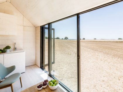 A Simple and Stylish Tiny Home with Airy Interiors in Spain by ÁBATON Arquitectura (13)