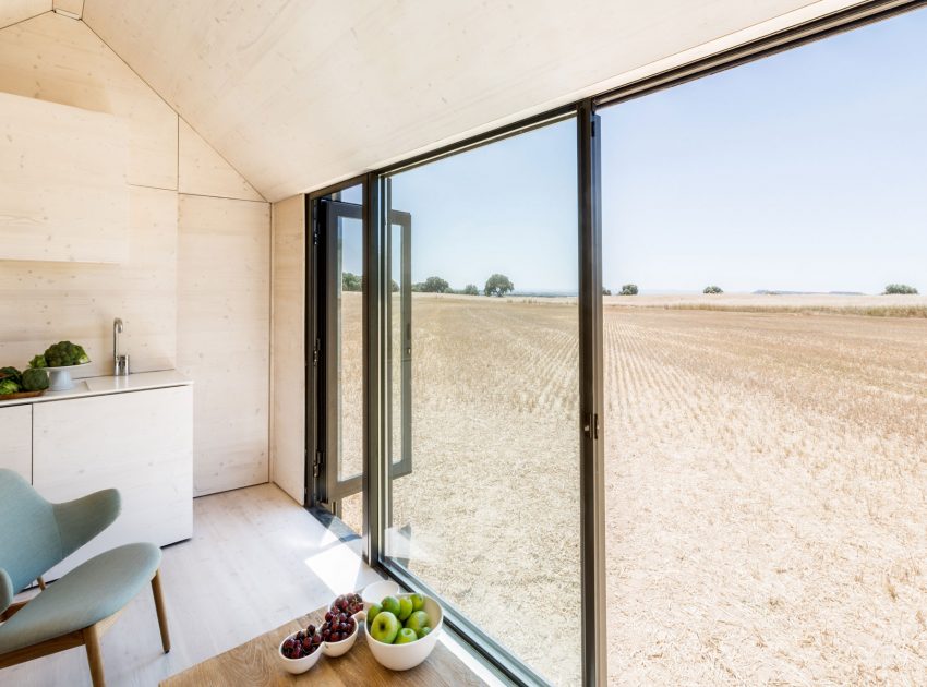 A Simple and Stylish Tiny Home with Airy Interiors in Spain by ÁBATON Arquitectura (13)