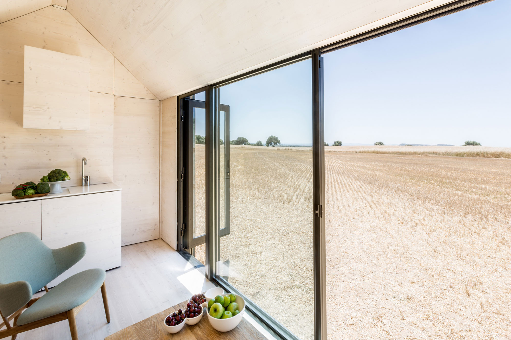 A Simple and Stylish Tiny Home with Airy Interiors in Spain by ÁBATON Arquitectura (13)