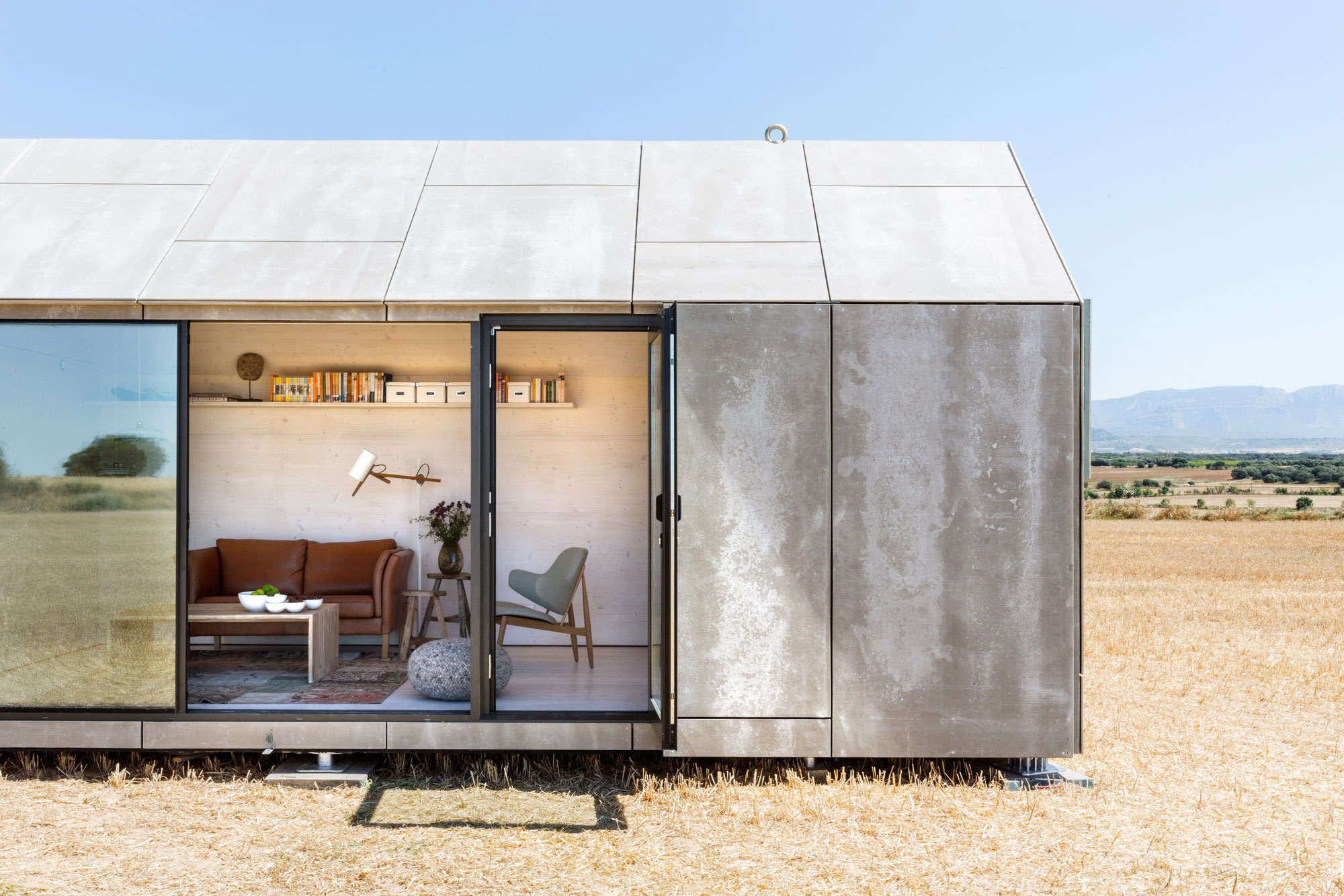 A Simple and Stylish Tiny Home with Airy Interiors in Spain by ÁBATON Arquitectura (2)