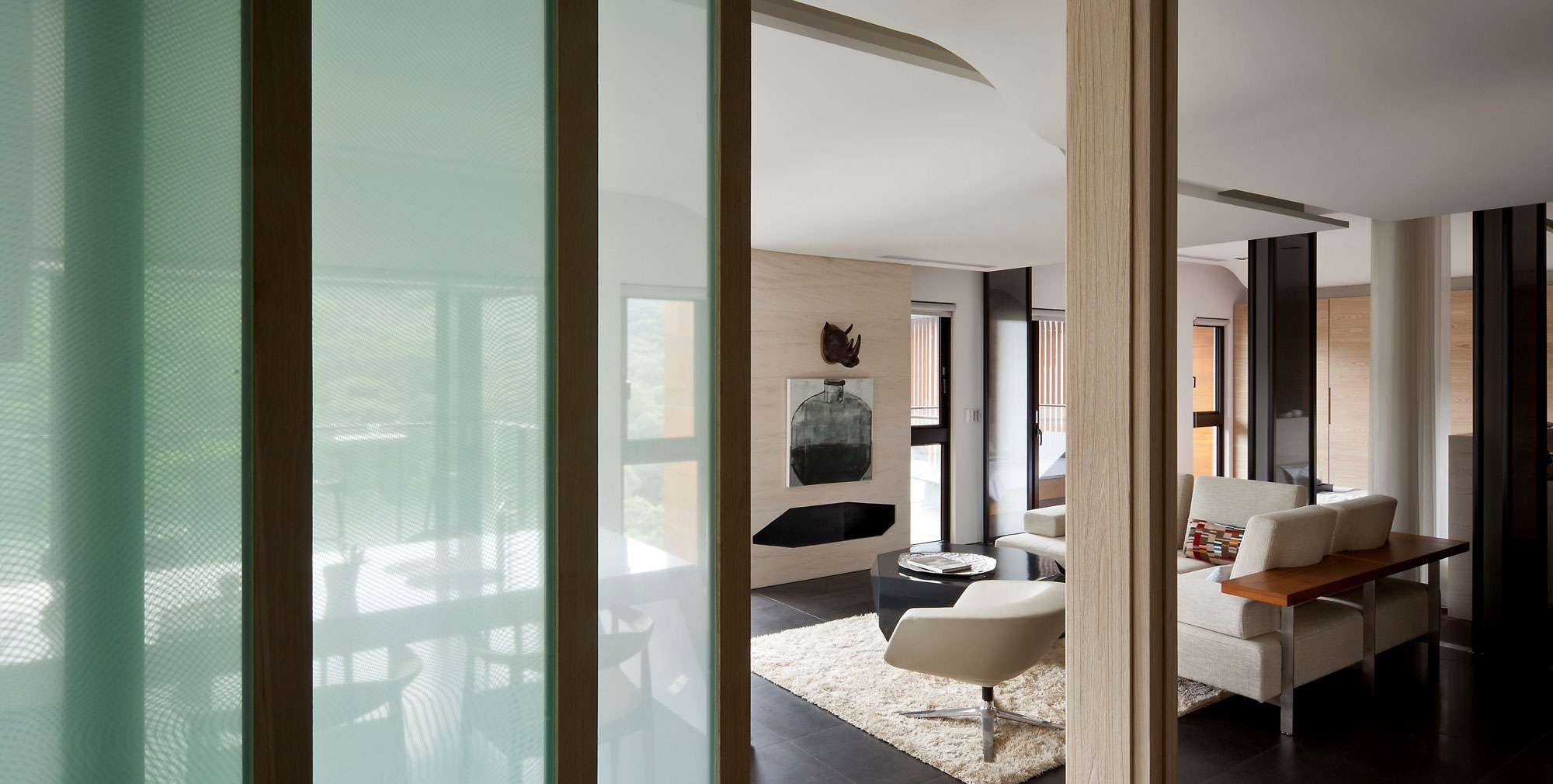 A Sleek Modern Home with Neutral Colors and Bold Accents in Taipei, Taiwan by J.C. Architecture (1)