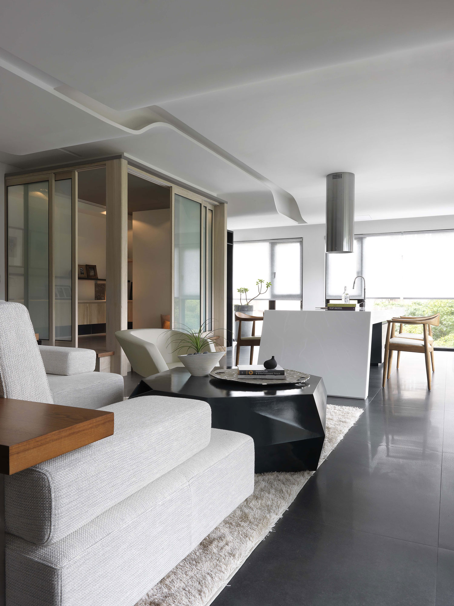 A Sleek Modern Home with Neutral Colors and Bold Accents in Taipei, Taiwan by J.C. Architecture (2)