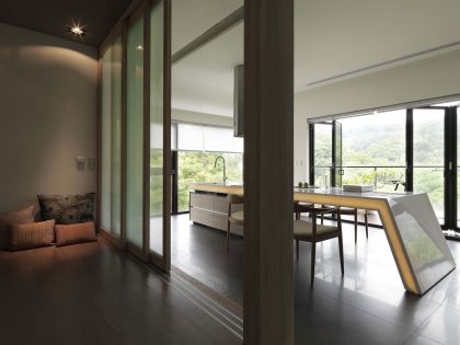 A Sleek Modern Home with Neutral Colors and Bold Accents in Taipei, Taiwan by J.C. Architecture (5)