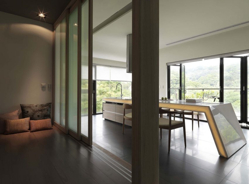 A Sleek Modern Home with Neutral Colors and Bold Accents in Taipei, Taiwan by J.C. Architecture (5)