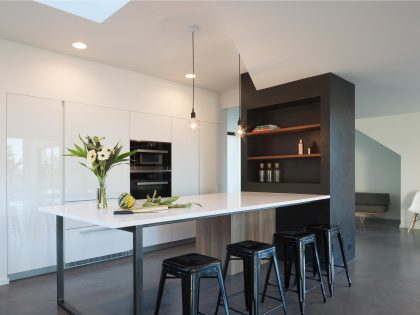 A Sleek and Bright Modern House Made of Concrete Forms, Metal and Glass in Seattle by Stephenson Design Collective (3)