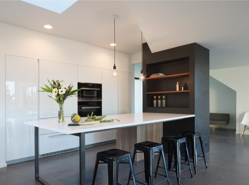 A Sleek and Bright Modern House Made of Concrete Forms, Metal and Glass in Seattle by Stephenson Design Collective (3)