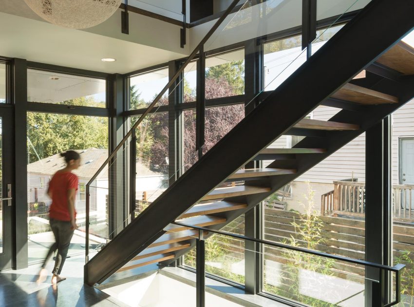 A Sleek and Bright Modern House Made of Concrete Forms, Metal and Glass in Seattle by Stephenson Design Collective (5)