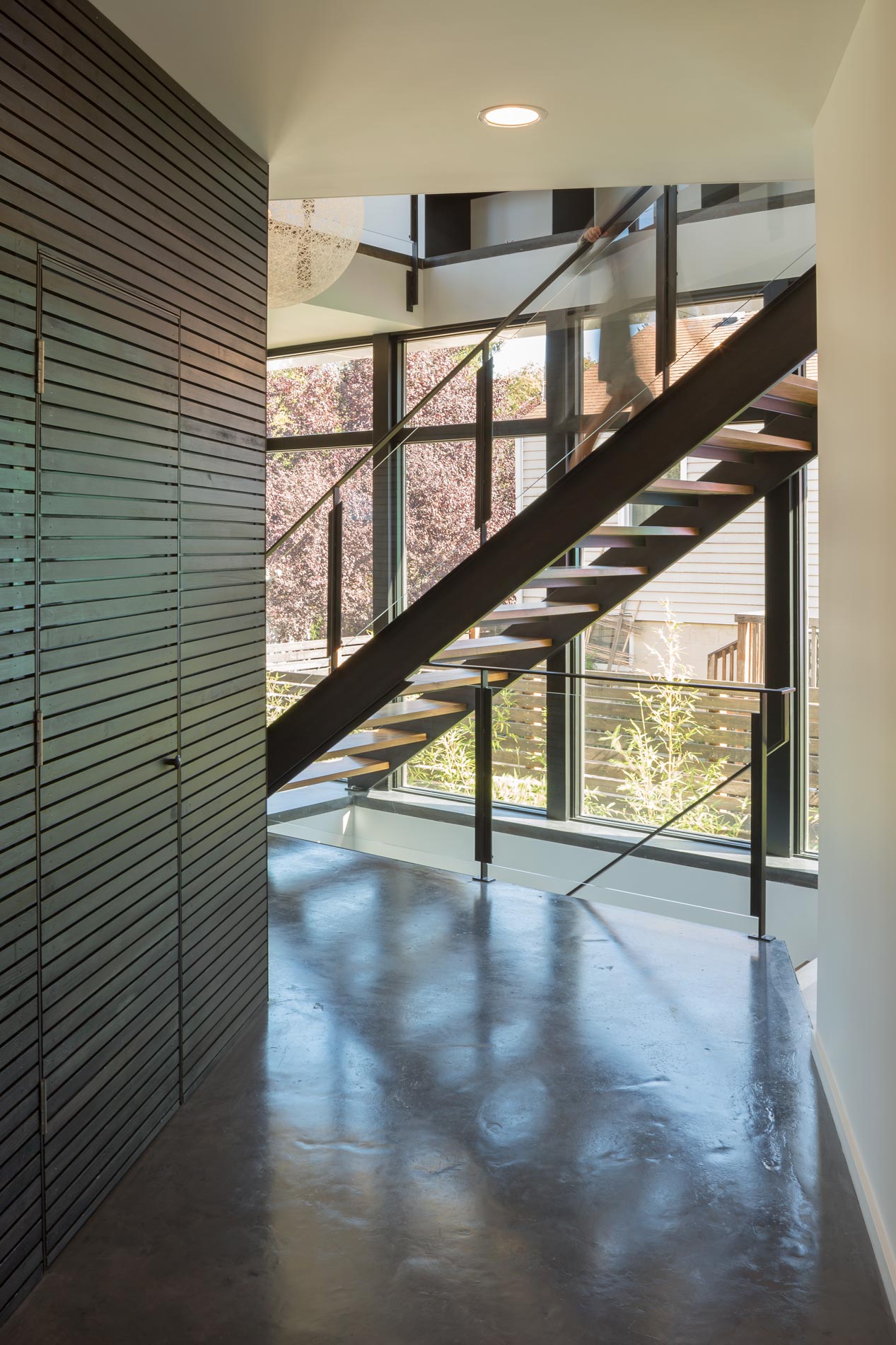 A Sleek and Bright Modern House Made of Concrete Forms, Metal and Glass in Seattle by Stephenson Design Collective (6)