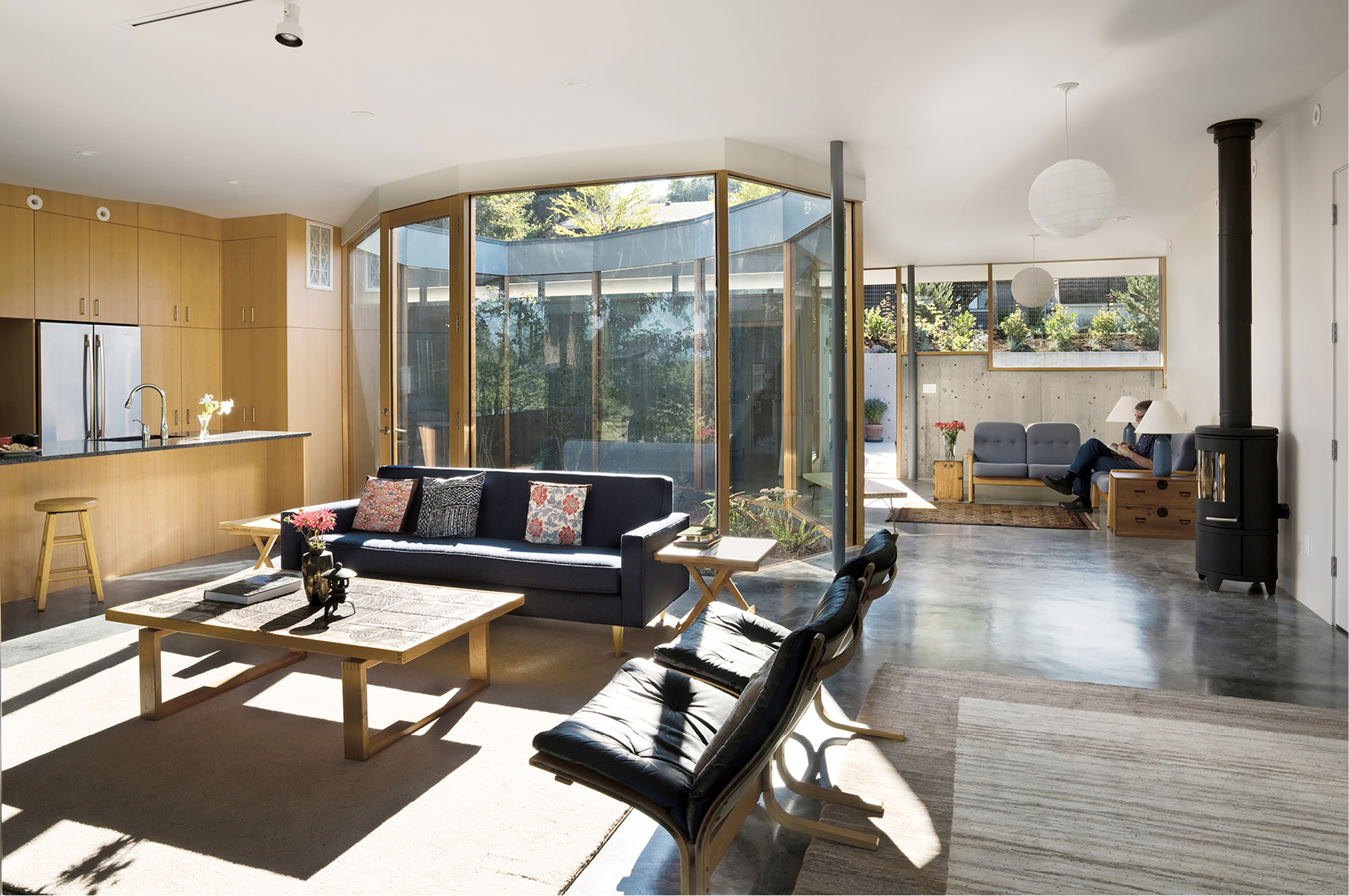 A Small Modern Hillside Home with Interior Courtyards and Gardens in Aurora by NO ARCHITECTURE (4)