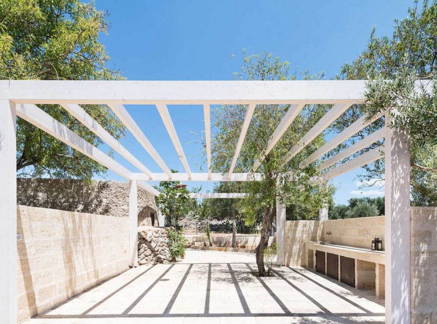 A Spacious Contemporary Home with Rustic and Unique Elements in Salve, Italy by Massimo Iosa Ghini (10)