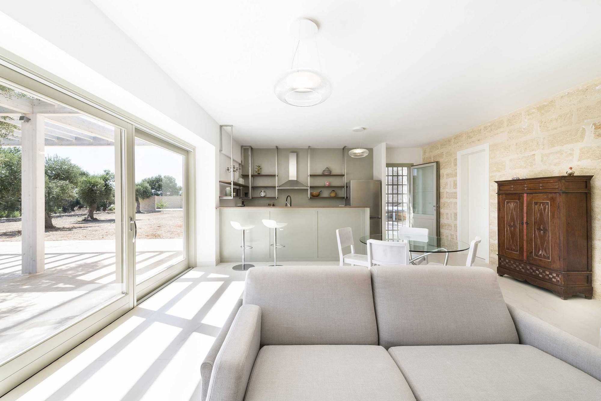 A Spacious Contemporary Home with Rustic and Unique Elements in Salve, Italy by Massimo Iosa Ghini (3)