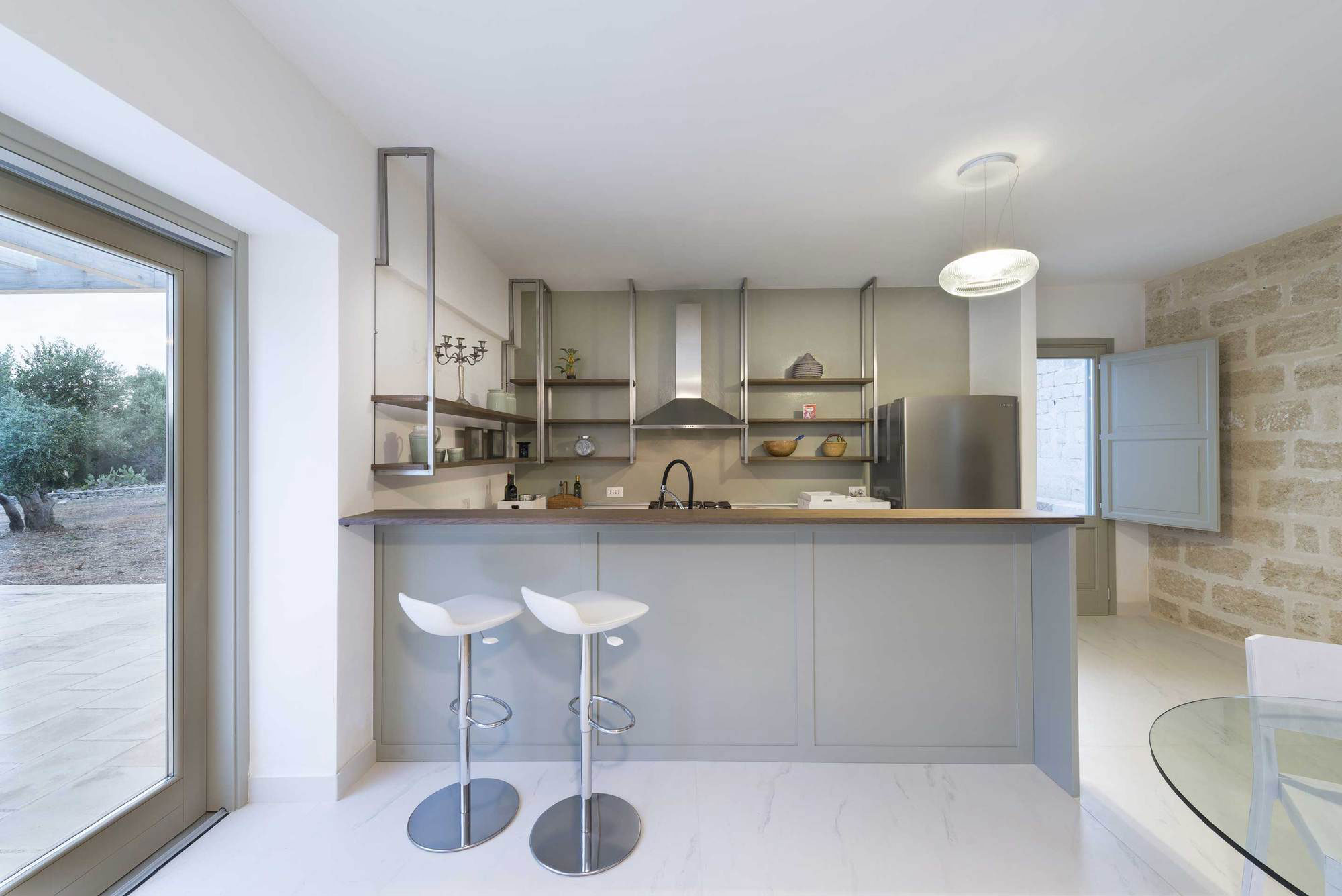 A Spacious Contemporary Home with Rustic and Unique Elements in Salve, Italy by Massimo Iosa Ghini (4)