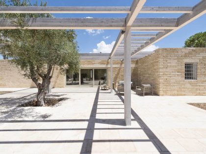 A Spacious Contemporary Home with Rustic and Unique Elements in Salve, Italy by Massimo Iosa Ghini (7)