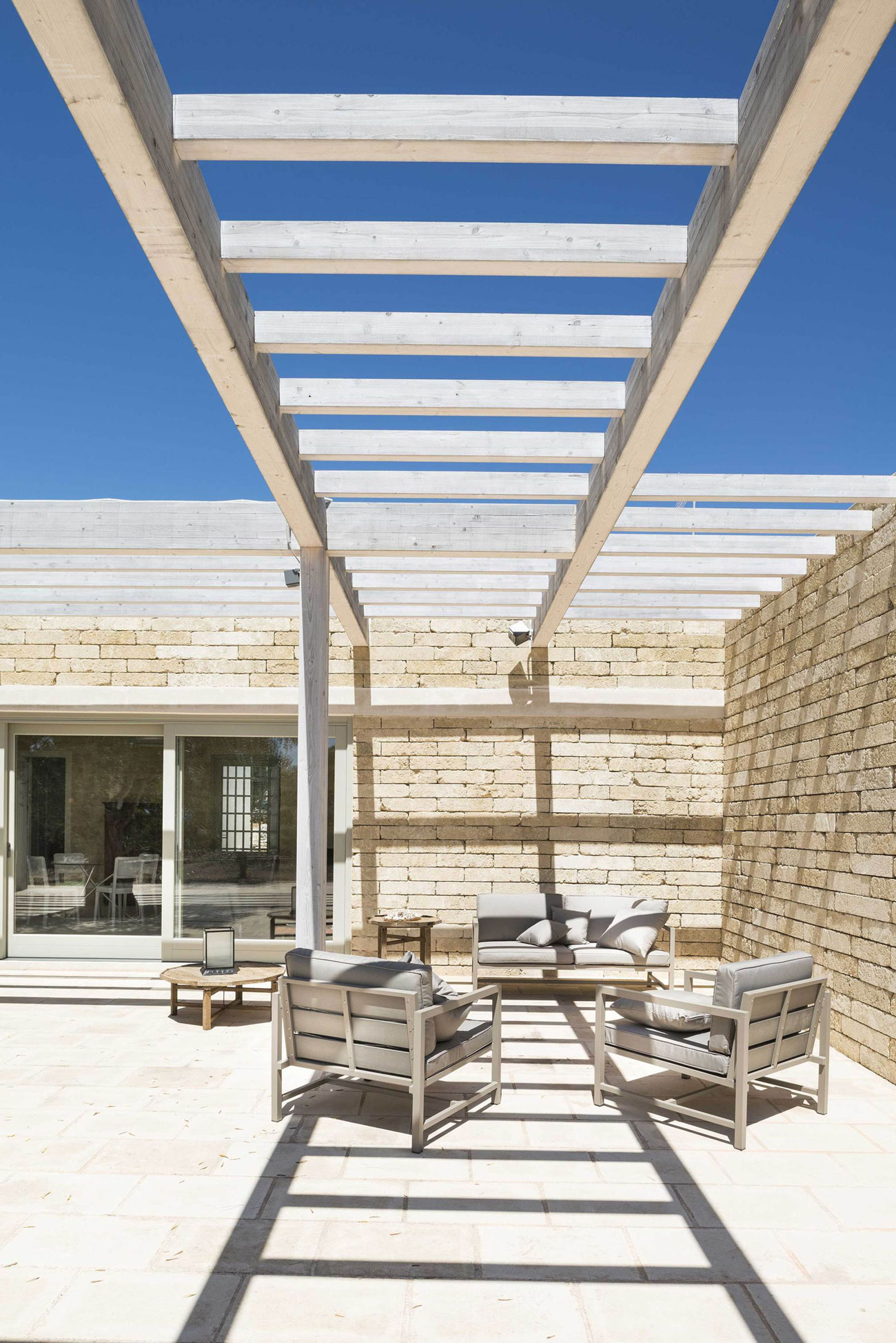 A Spacious Contemporary Home with Rustic and Unique Elements in Salve, Italy by Massimo Iosa Ghini (8)