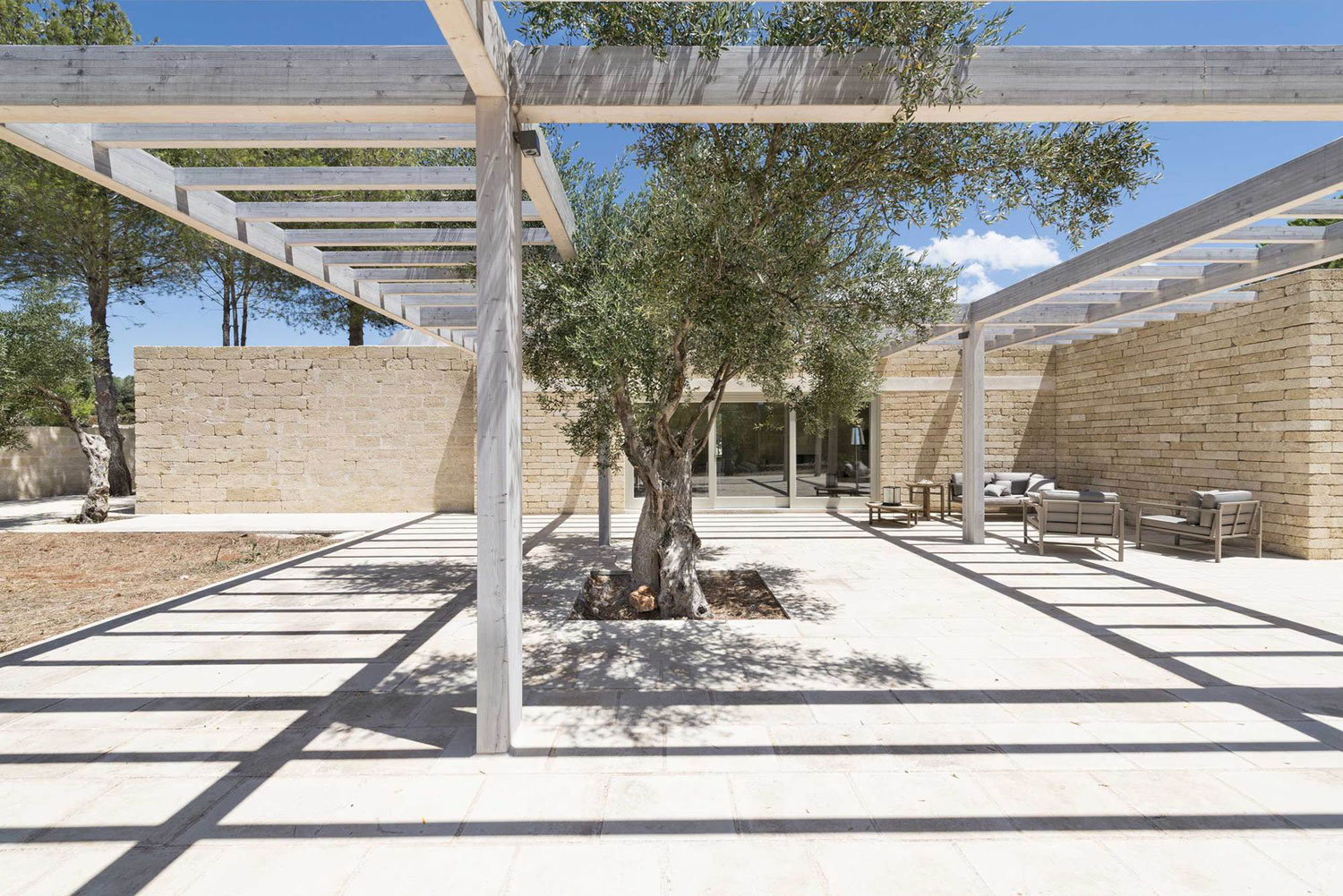 A Spacious Contemporary Home with Rustic and Unique Elements in Salve, Italy by Massimo Iosa Ghini (9)