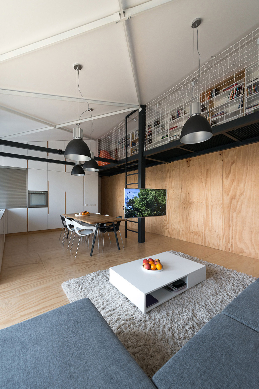 A Spacious Modern Apartment with a Marked Industrial Style in Bratislava by RULES architects (4)