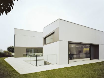 A Spacious Modern House with a Relaxing Decor Done in White in Tübingen, Germany