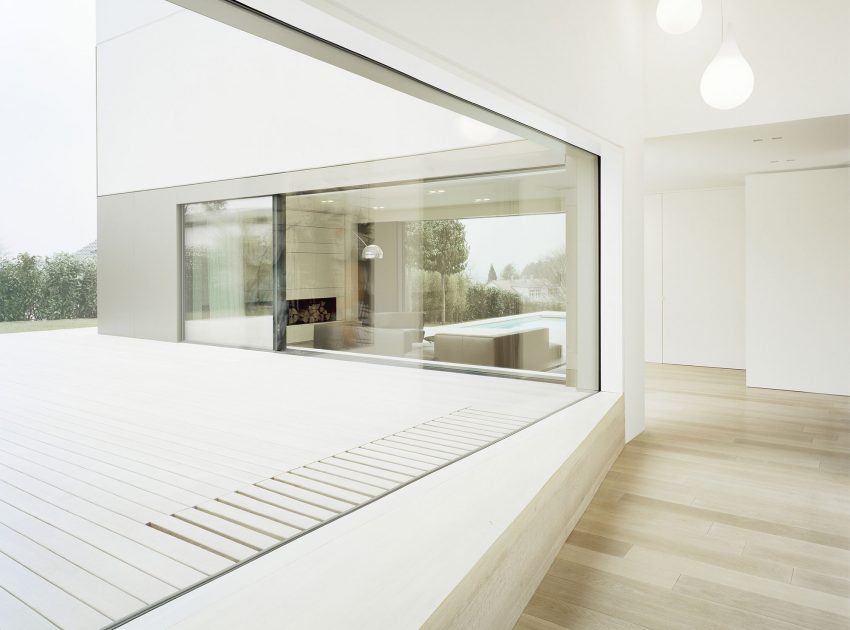 A Spacious Modern House with a Relaxing Decor Done in White in Tübingen, Germany by Steimle Architekten (13)