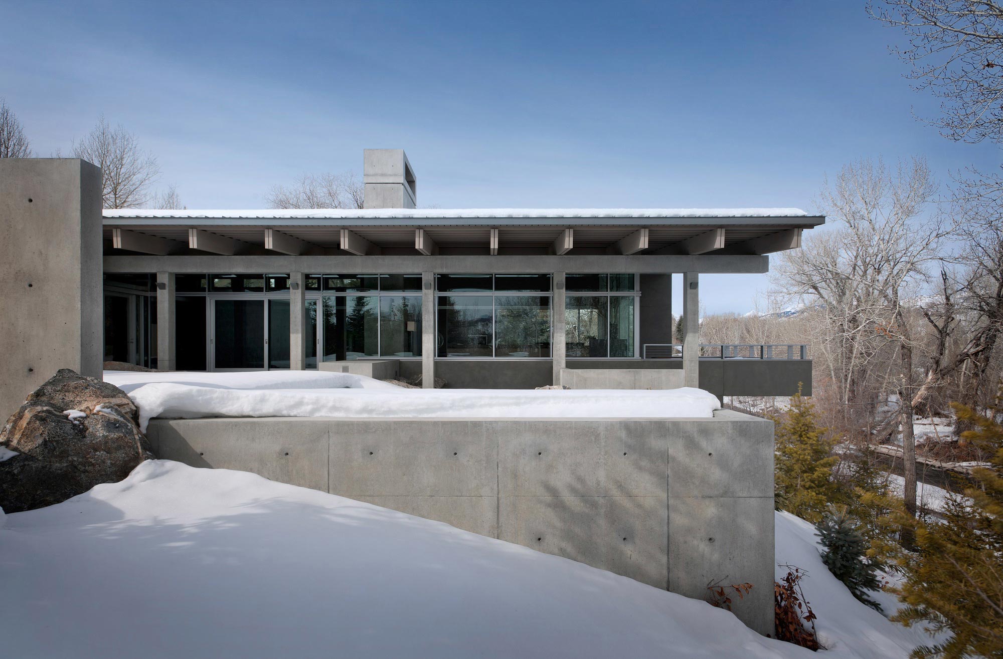 A Spectacular Concrete House Surrounded by Snow Filled Trees Mountain of USA by Suyama Peterson Deguchi (1)