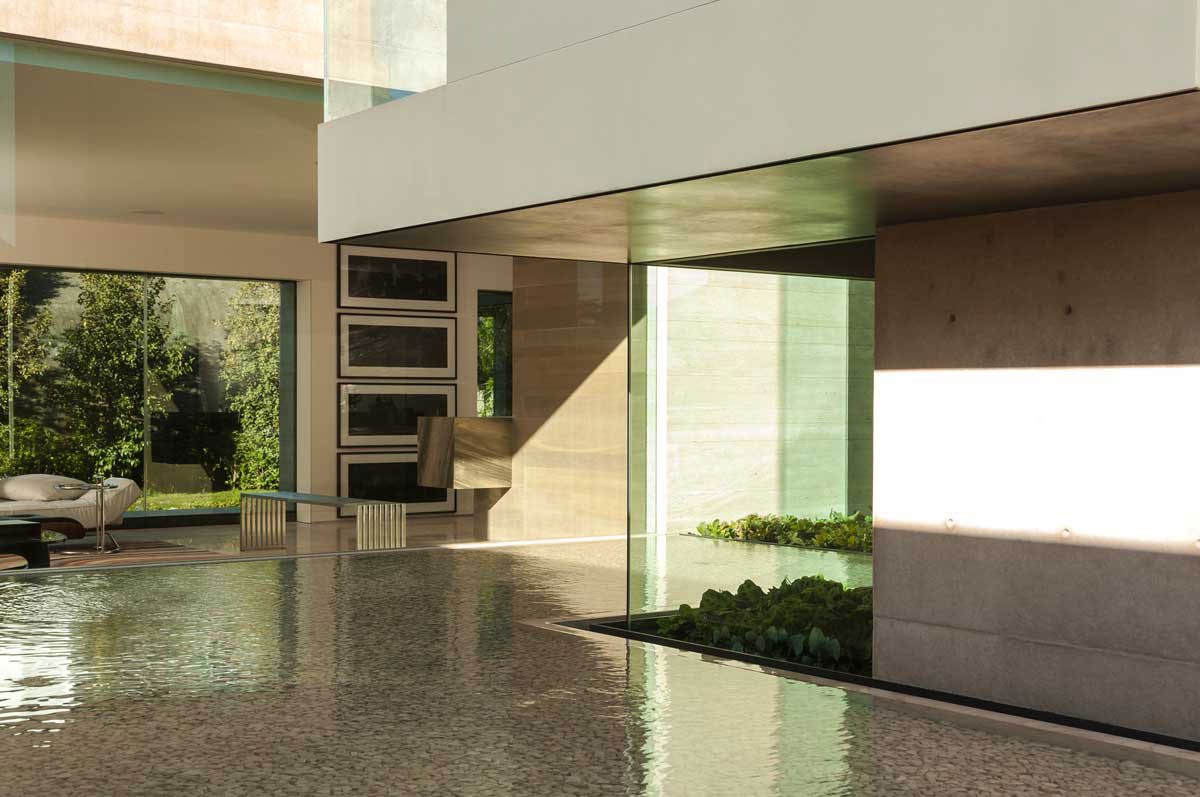 A Steel, Glass, Stone and Colored Concrete Home with Dramatic Central Staircase in Mexico City by Gantous Arquitectos (13)