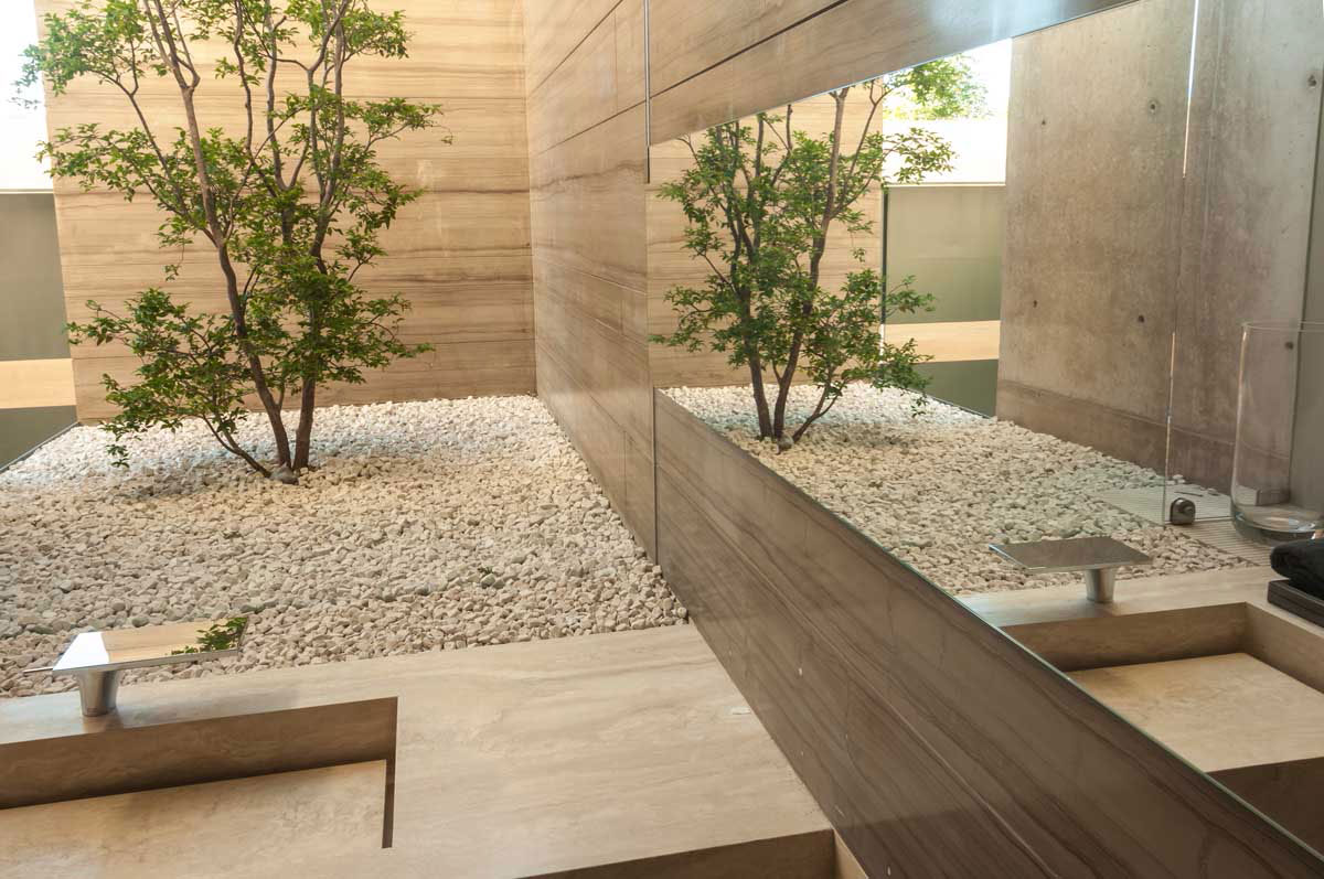 A Steel, Glass, Stone and Colored Concrete Home with Dramatic Central Staircase in Mexico City by Gantous Arquitectos (14)