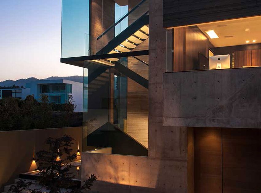 A Steel, Glass, Stone and Colored Concrete Home with Dramatic Central Staircase in Mexico City by Gantous Arquitectos (22)