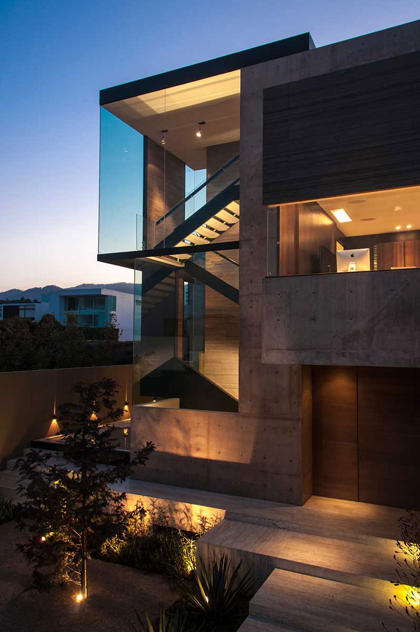 A Steel, Glass, Stone and Colored Concrete Home with Dramatic Central Staircase in Mexico City by Gantous Arquitectos (22)