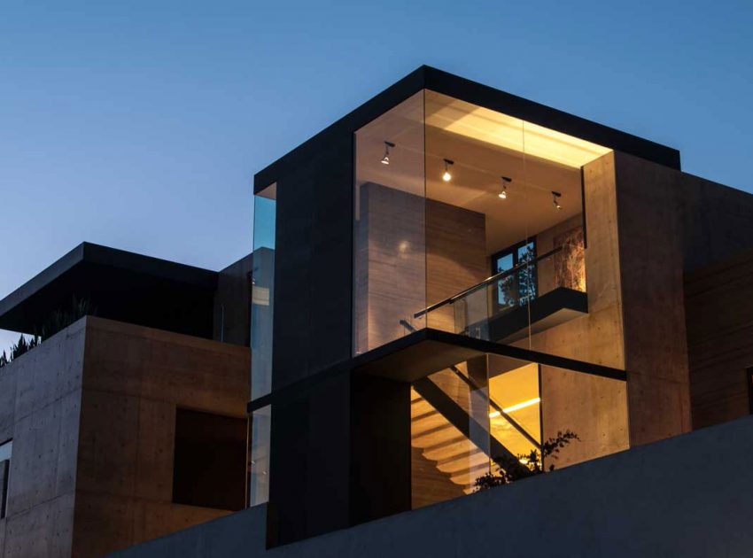 A Steel, Glass, Stone and Colored Concrete Home with Dramatic Central Staircase in Mexico City by Gantous Arquitectos (23)