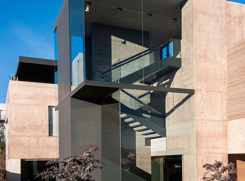 A Steel, Glass, Stone and Colored Concrete Home with Dramatic Central Staircase in Mexico City by Gantous Arquitectos (3)
