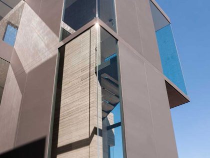A Steel, Glass, Stone and Colored Concrete Home with Dramatic Central Staircase in Mexico City by Gantous Arquitectos (5)