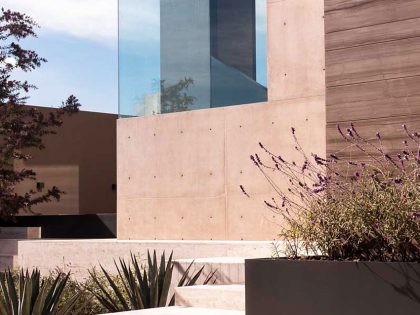 A Steel, Glass, Stone and Colored Concrete Home with Dramatic Central Staircase in Mexico City by Gantous Arquitectos (8)