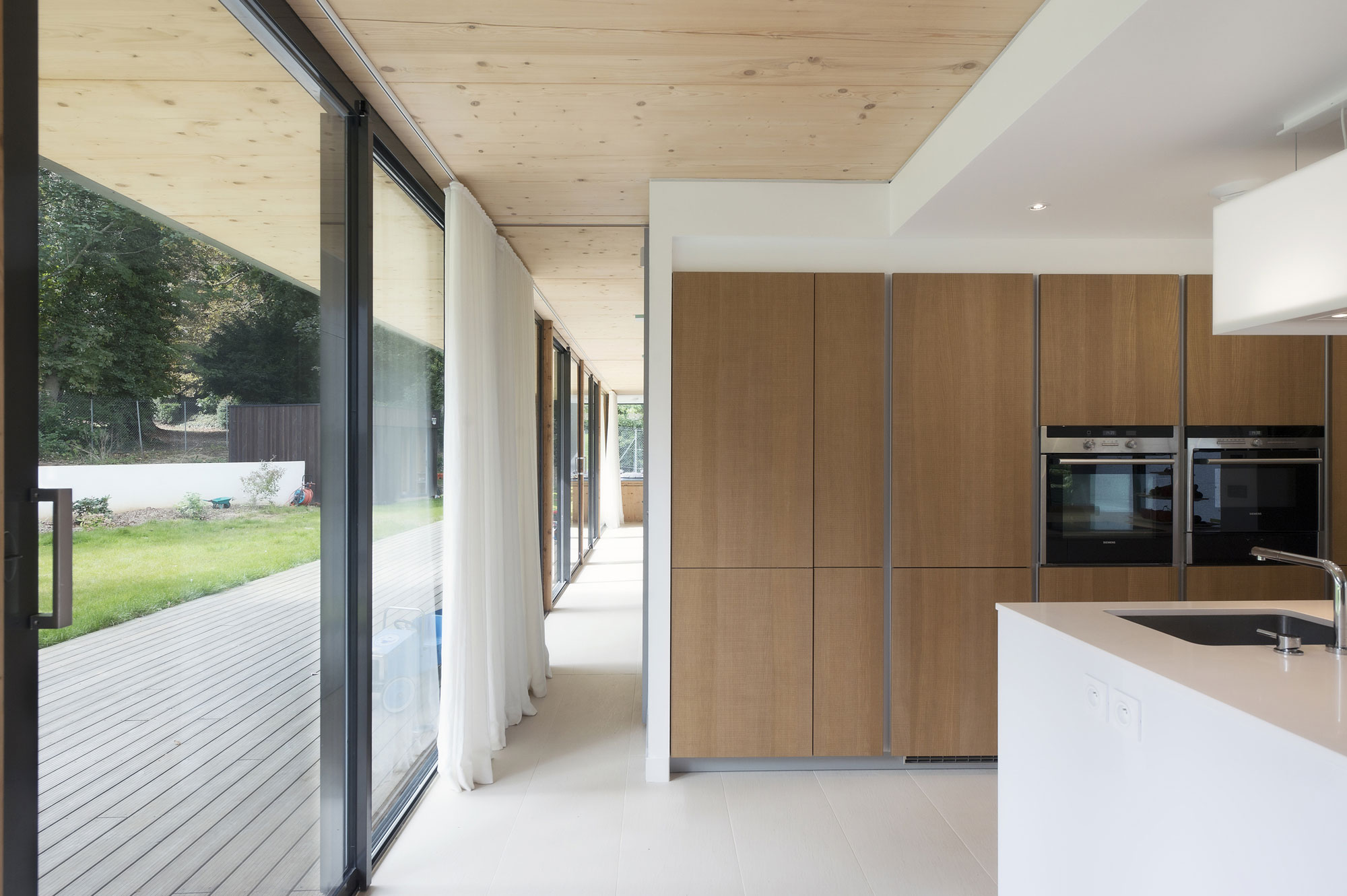 A Striking Contemporary Home with Glass Facades in Montmorency, France by A+B architectes dplg (15)