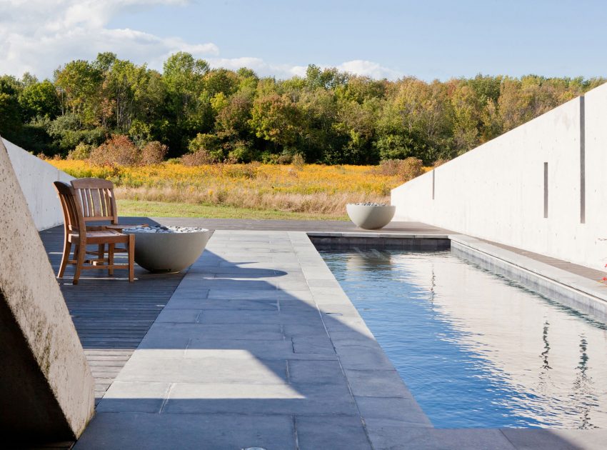 A Striking and Dramatic Lakeside House Hidden in a Dense Forest of Port Hope by Teeple Architects (2)