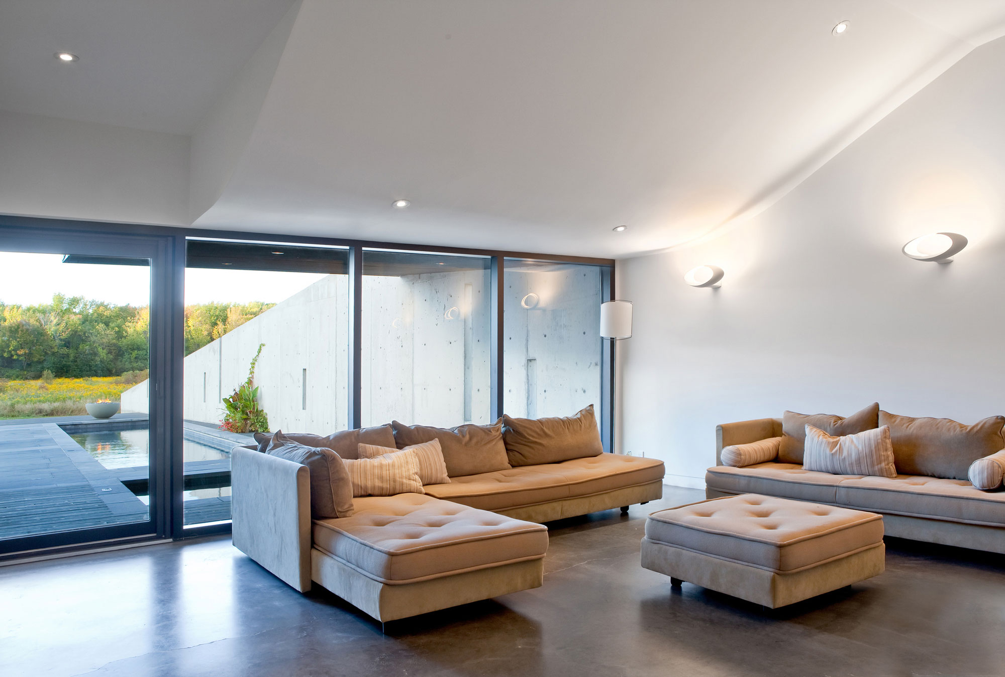 A Striking and Dramatic Lakeside House Hidden in a Dense Forest of Port Hope by Teeple Architects (3)