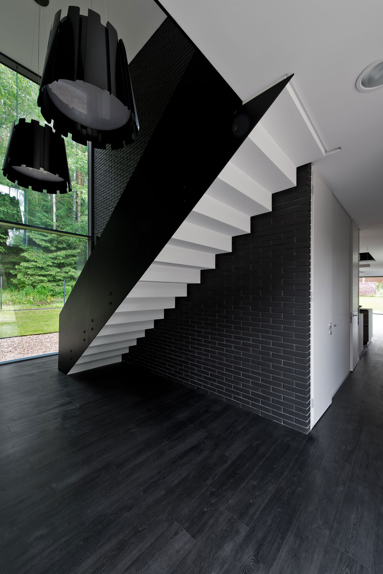 A Stunning Contemporary Home with Dramatic Black Exteriors in Minsk by Architectural Bureau G. Natkevicius & Partners (10)