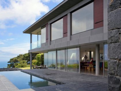 A Stunning Family Home with Large Courtyard and Infinity Pool in Guernsey, Channel Islands by Jamie Falla Architecture (1)