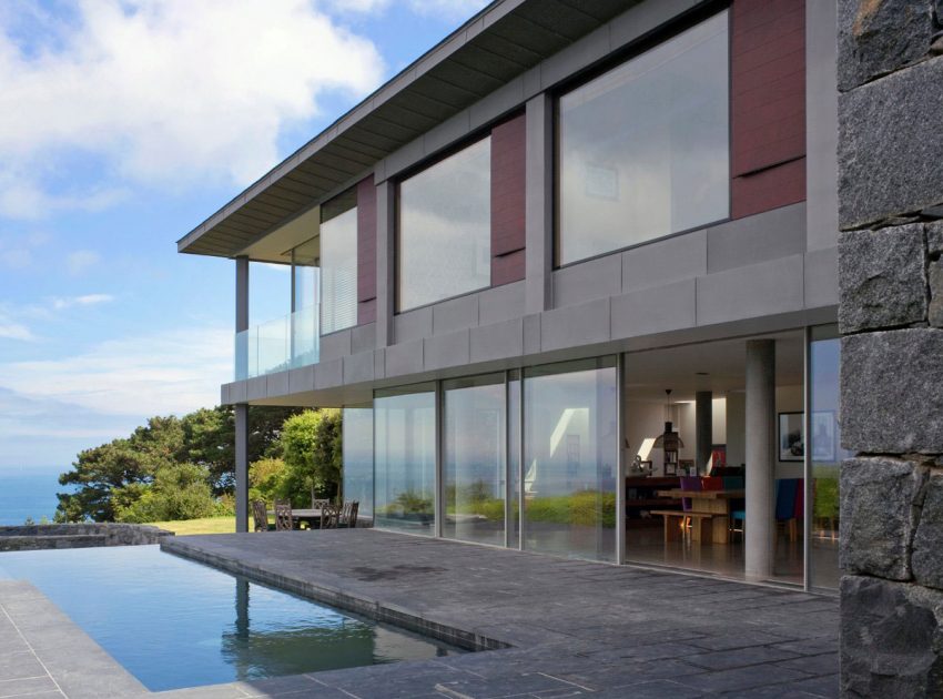 A Stunning Family Home with Large Courtyard and Infinity Pool in Guernsey, Channel Islands by Jamie Falla Architecture (1)