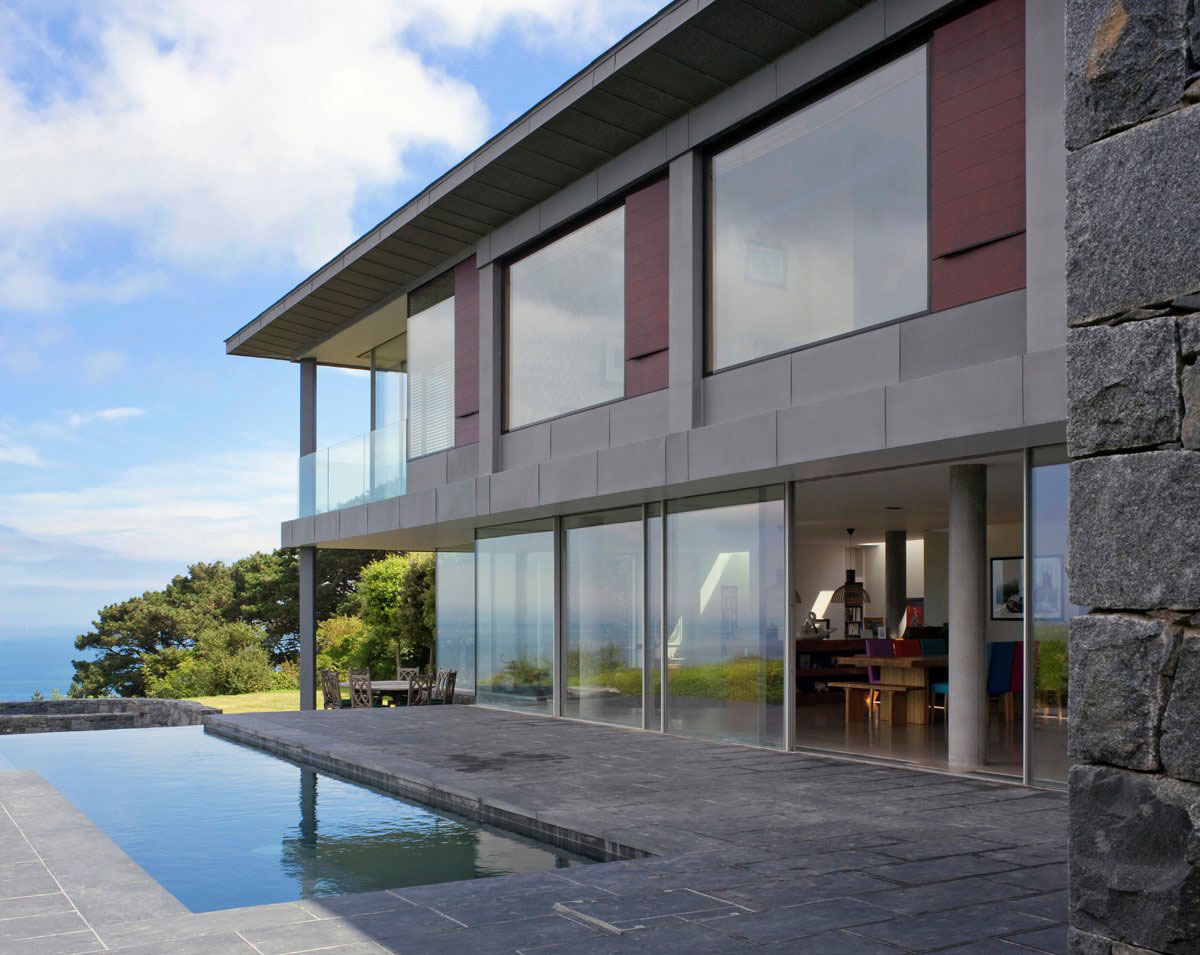 A Stunning Family Home with Large Courtyard and Infinity Pool in Guernsey, Channel Islands by Jamie Falla Architecture (1)