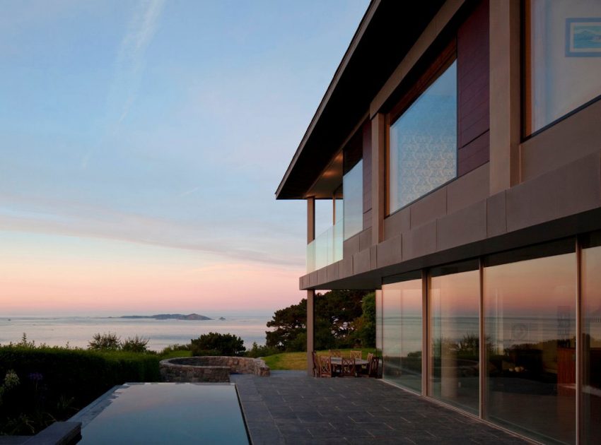 A Stunning Family Home with Large Courtyard and Infinity Pool in Guernsey, Channel Islands by Jamie Falla Architecture (12)