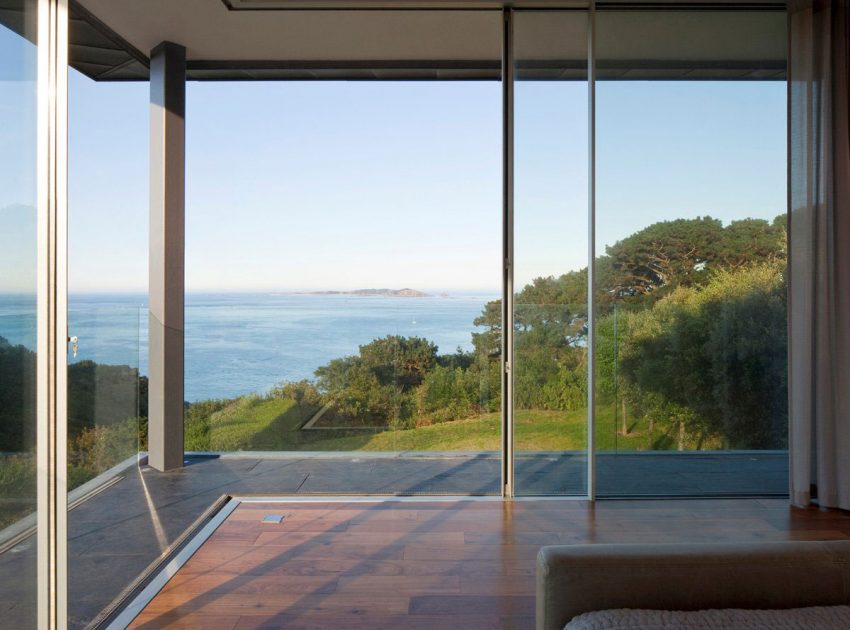 A Stunning Family Home with Large Courtyard and Infinity Pool in Guernsey, Channel Islands by Jamie Falla Architecture (9)