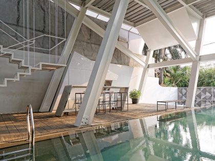 A Stunning Glass House with Slanted Steel Frame and Indoor Pool in Jakarta by Budi Pradono Architects (11)