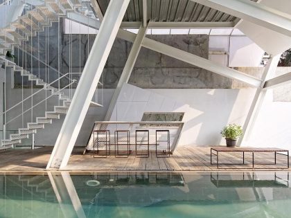 A Stunning Glass House with Slanted Steel Frame and Indoor Pool in Jakarta by Budi Pradono Architects (12)