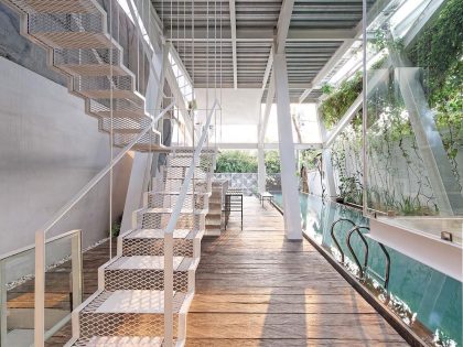 A Stunning Glass House with Slanted Steel Frame and Indoor Pool in Jakarta by Budi Pradono Architects (5)